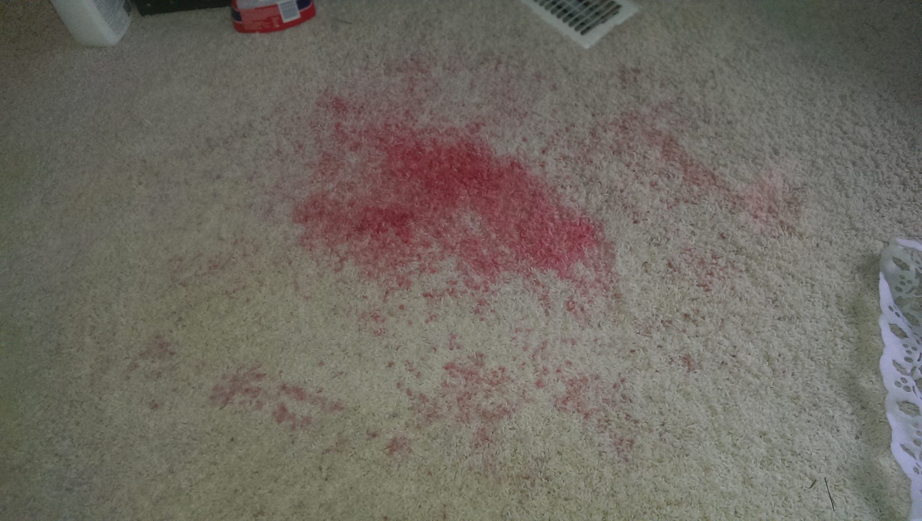 Before: cranberry juice stain on light beige carpet