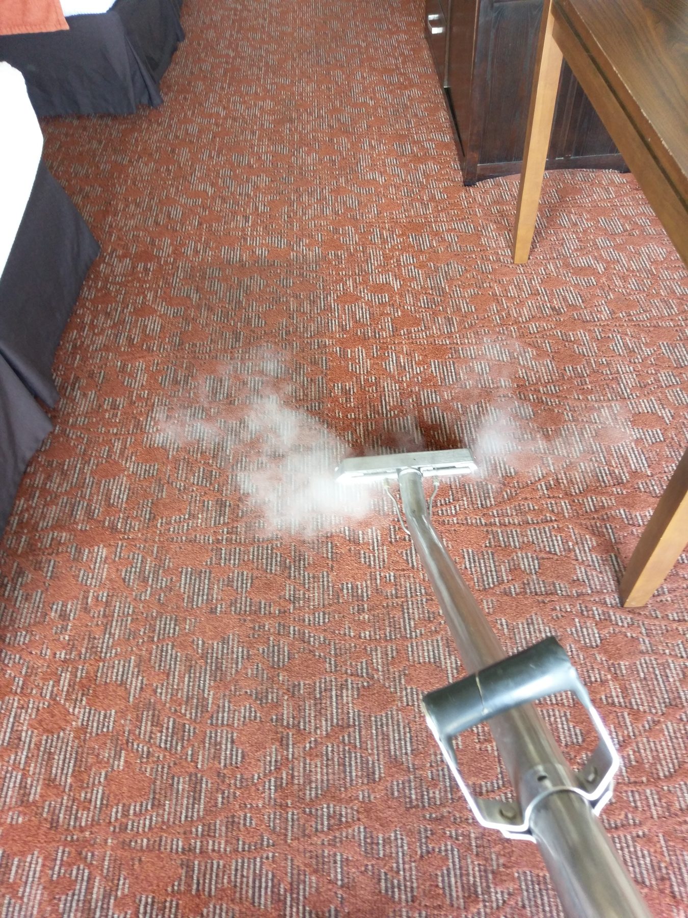 Truck-mount wand steaming commercial carpet